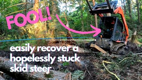 getting a skid steer unstuck|skid steer recovery.